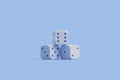 Pyramid of White Dice on Light Blue Background