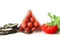 Pyramide of sauages with vegetables Royalty Free Stock Photo