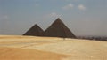 Pyramids on the background of Cairo. Approximation