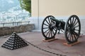 Pyramids of cannonballs and cannon near Prince Palace in Monaco Royalty Free Stock Photo