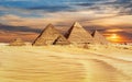 Pyramids of Egypt at sunset, famous Wonder of the World, Giza Royalty Free Stock Photo