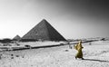 Pyramids Giza and Arabian girl