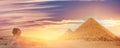 Pyramids of Giza in Cairo Egypt and Sphinx dramatic sunset sky. Banner travel Egyptian Royalty Free Stock Photo