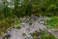 Pyramids of stones in Karelia. Pyramids of stones on a background of green forest