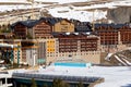 PYRENEES, ANDORRA - FEBRUARY 13, 2019: Multi-storey hotel buildings at the foot of the mountain and ski slopes in the Royalty Free Stock Photo