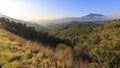 Pyrenees mountain peak landscape on a solid blue sky and green forest trees Royalty Free Stock Photo