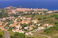 Pyrenees Orientales Vermilion coast landscape, vineyards fields with the village of Collioure Royalty Free Stock Photo