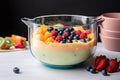 pyrex bowl filled with creamy, fruity smoothie