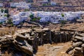 Church, whitewashed houses and arid landscape on Tinos Island