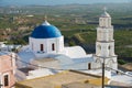 Orthodox church and bell tower in Pyrgos town, Greece. Royalty Free Stock Photo