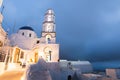 PYRGOS, GREECE - MAY 2018: View of orthodox church and bell tower in Pyrgos town center, Santorini island, Greece