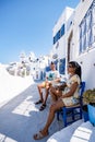 Pyrgos village Santorini with blue domes and whitewashed house during sunset at the Island of Santorini Greece Royalty Free Stock Photo