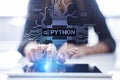 Python high-level programing language. Application and web development concept on virtual screen.