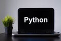 Python programming language. Programming training, the concept of computer courses. Laptop on the table