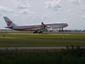 PZ-TCP Surinam Airways Airbus A340 landing on the Buitenveldertbaan 09-27 landing strip at Amsterdam Schiphol Airport in the Nethe