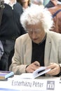 Peter Esterhazy - famous Hungarian writer dedicating his books in Budapest Book Festival