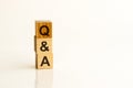 Q and A - acronym from wooden blocks with black letters. Copy space available Royalty Free Stock Photo