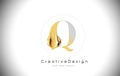 Q Golden Letter Design Brush Paint Stroke. Gold Yellow q Letter Logo Icon with Artistic Paintbrush