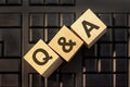 Q and A - Question And Answer - letters on wooden blocks Royalty Free Stock Photo