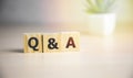 Q A or Questions and answers on black block with sunshine background Royalty Free Stock Photo