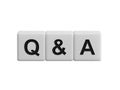 QA Question answer. The wooden cubes form the word QA Question answer. Business The concept of QA Question answer Royalty Free Stock Photo