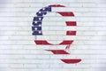 QAnon symbol sprayed on white house wall, conspiracy theory, deep state conservative concept Royalty Free Stock Photo
