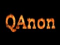 QAnon or Q Anon deep state conspiracy theory text on fire