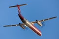 QantasLink Bombardier DHC-8-402 twin engine turboprop regional airliner taking off from Adelaide Airport Royalty Free Stock Photo