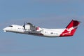 QantasLink Eastern Australia Airlines de Havilland Canada Dash 8 twin engine turboprop regional airliner aircraft taking off fro Royalty Free Stock Photo