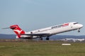 QantasLink Qantas Boeing 717 regional jet airliner taking off from Sydney Airport.