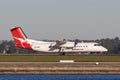 QantasLink Qantas deHavilland DHC-8 Dash 8 twin engined regional airliner aircraft departing Sydney Airport.