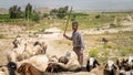 Qashqai Turkish shephard man with his goats, Shiraz, Iran