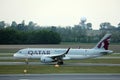Qatar Airways Plane doing taxi on runway
