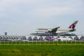 Qatar airplane landing to runways at suvarnabhumi international airport in Bangkok ,Thailand.