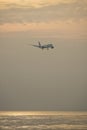 Qatar airways airplane landing at phuket airport in hazy day Royalty Free Stock Photo