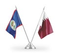 Qatar and Belize table flags isolated on white 3D rendering