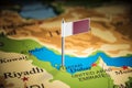 Qatar marked with a flag on the map Royalty Free Stock Photo