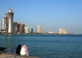 Qatari couple on Doha Corniche Royalty Free Stock Photo