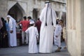 The Qatari family in traditional attire.