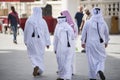 The Qatari family in traditional attire.