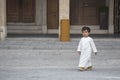 Qatari kid in traditional outfit