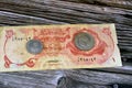 Qatari Money, money background of old coins and banknotes of riyals of different eras, old vintage retro Qatar money coin and