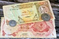 Qatari Money, money background of old coins and banknotes of riyals of different eras, old vintage retro Qatar money coin and