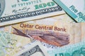 Qatari riyals and American dollars,