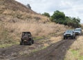 Mitsubishi Pajero SUVs and an ATV ride on a country road near the Jordan River in the Golan Heights in northern Israel