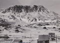 Qerqertarsuaq, Greenland - Circa 1955: Mail delivery to Qerqertarsuaq by USAF Dakota plane flying low over the settlement. Can you