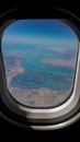 qeshm island from above during flight from airplane window, persian gulf, iran Royalty Free Stock Photo