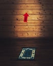 Qibla arrow in a prayer room Royalty Free Stock Photo