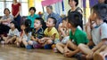 Qingyuan, China - June 23, 2016: group of children and parents are listening to the teacher in a classroom at the kindergarten