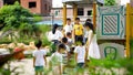 Qingyuan, China - June 23, 2016: Playground with kids in a kindergarten playing together
